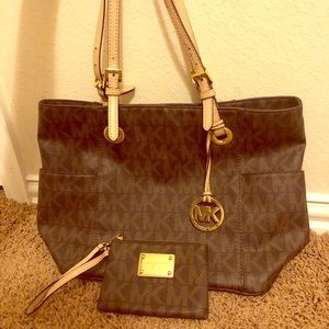Michael Kors signature handbag with a wallet